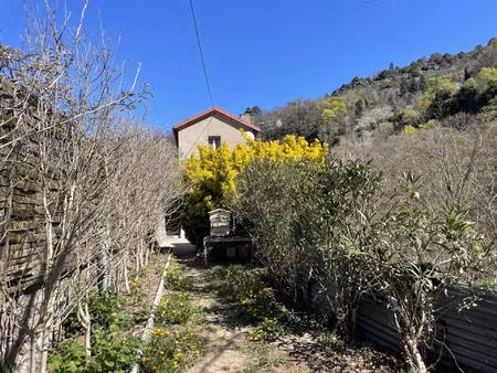 maison de type 3 avec garage sur terrain d'environ 1340 m2 p