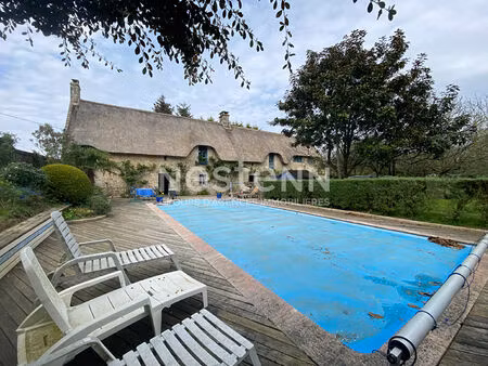 longère en pierres à 10 minutes de vannes terrain 4900 m2 piscine environ 3 chambres.