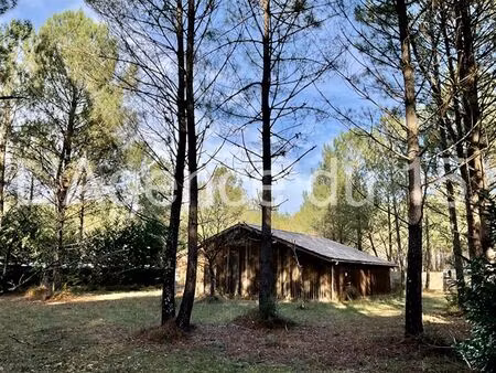 terrain en zone naturelle avec bâtiment de stockage