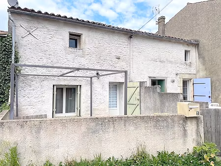 ensemble immobilier 2 logements loués avec garages et espaces extérieurs