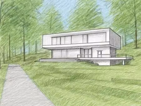terrain à bâtir de plus de 42 ares en environnement boisé