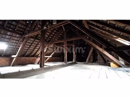 combles aménageables de 110m² habitables avec cave et parking privé