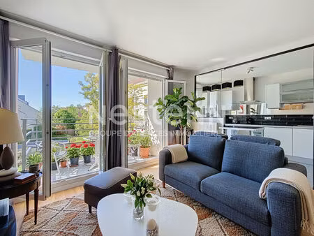 a vendre. appartement montigny le btx au village 3 pièces  cave   parking.