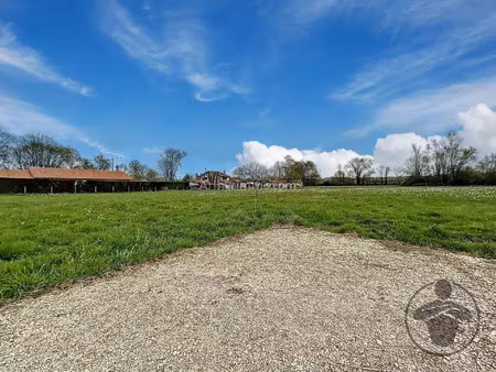 vente terrain 1060 m2 à saint-médard-de-guizières
