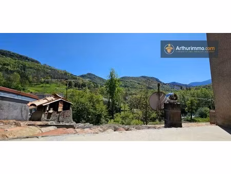 charmante maison de 4 chambres (87 m²) avec garage et balcon  située dans un village calme
