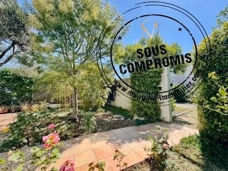 maison plain pied - véranda et garage