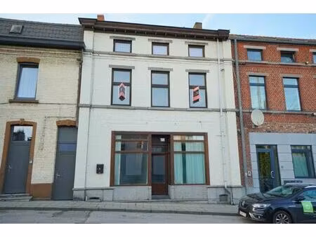 maison de commerce et d'habitation.