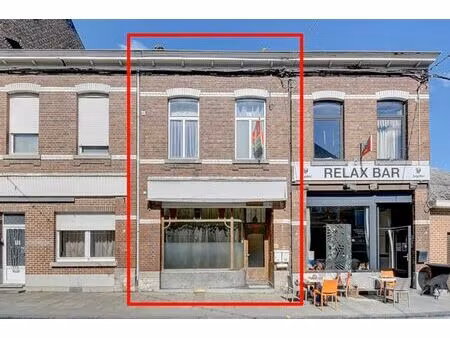 maison de commerce et d'appartement en bon etat