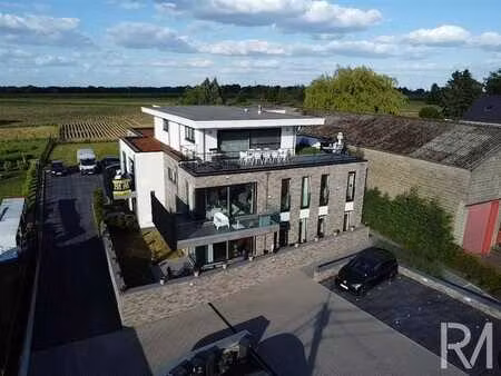 appartement 95m² 2 ch/balcon/parking à juprelle