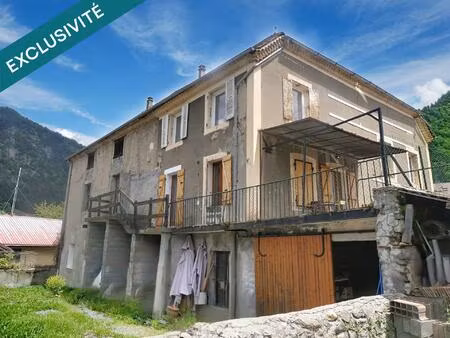 immeuble avec un jardin et un énorme potentiel