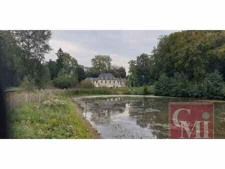 appartement f3 (rez-de jardin) avec veranda et jardin attenant d'env.365m2 - 2 places de s