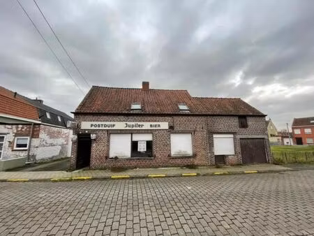 maison de commerce 3 façades sise à sint-denijs