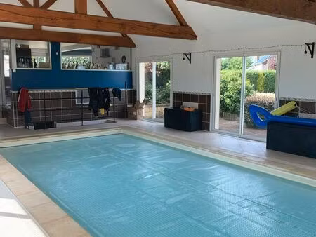 maison avec piscine intérieure