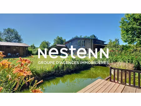 a vendre chalet bois 187m² avec dépendances  garages et studio de musique.