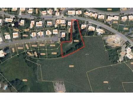 terrain sis à waltzing  à front de la rue du rhin