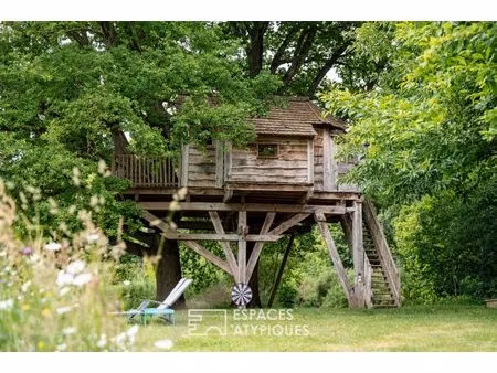propriété avec cabanes dans les arbres
