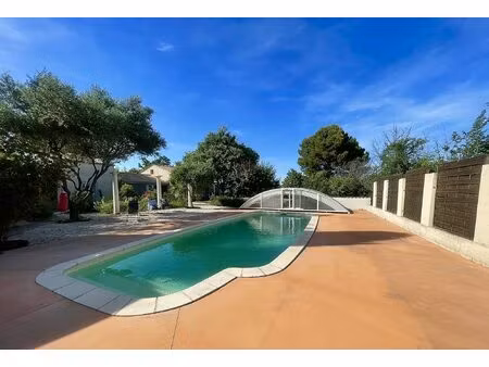 villa familiale traversante de plain-pied avec jardin paysager &