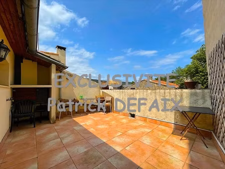 maison de village avec terrasse de toit