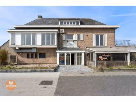 ruime woning met handelspand