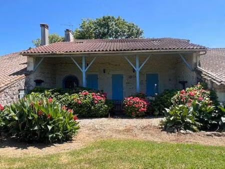 demeure en pierre avec dépendances et parc arboré