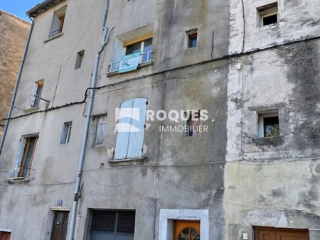 immeuble rez-de-chaussée plus 3 étages d' environ 170 m2 uti