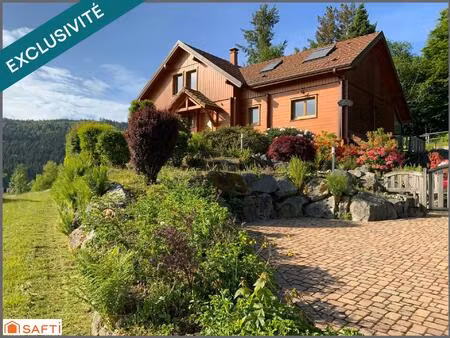 chalet d'exception avec grand terrain paysagé de 2000 m2   proximité des pistes et de la n