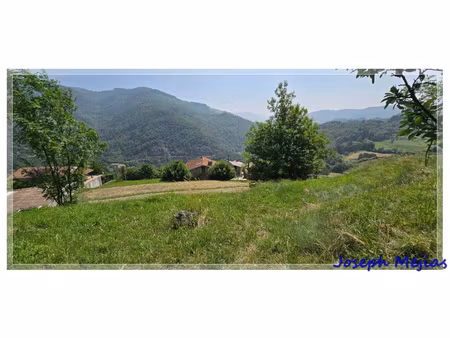 à vendre – terrain de 6 504 m² à jaunac (07) – vue imprenable  au calme  proche le cheylar