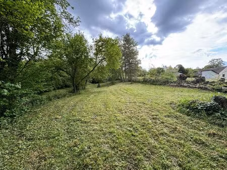 nebouzat ! terrain constructible 1189m² borné.