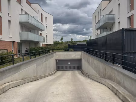 a vendre - 1 place de parking double en sous-sol