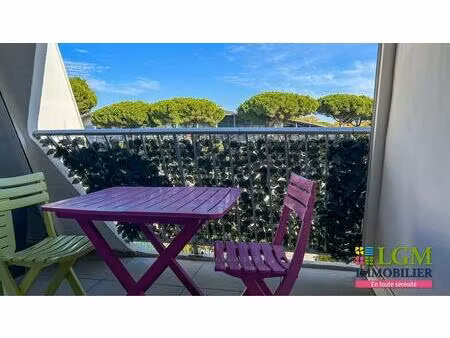 studio avec balcon et place de stationnement