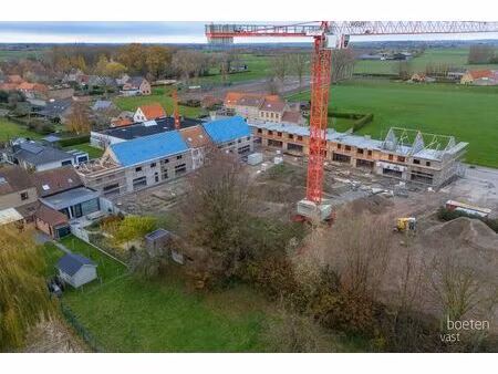 beauvoorde: woonomgeving de lelie: 18 nieuwbouwwoningen in het landelijke en historische b