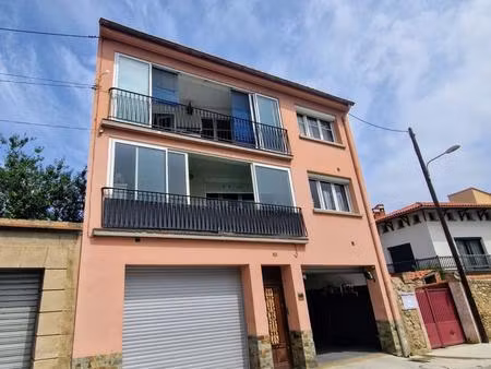 immeuble 2 logements + 2 garages + jardin