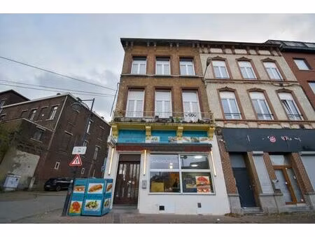 delfimmo - maison de commerce bien situee !