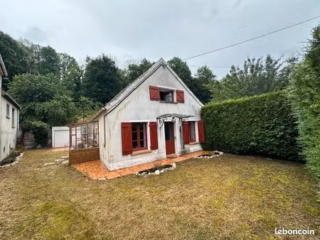 mignonne maison avec garage et terrain