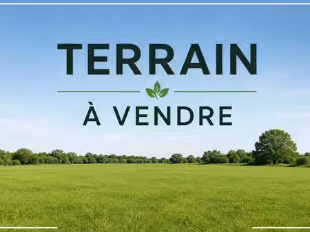 beau terrain constructible de 830 m² dans un environnement calme