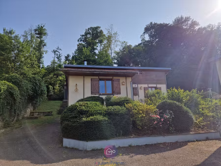 à vendre charmante maison située dans un cadre verdoyant en