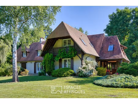 propriété traversée par la rivière dans un des plus beaux villages de france