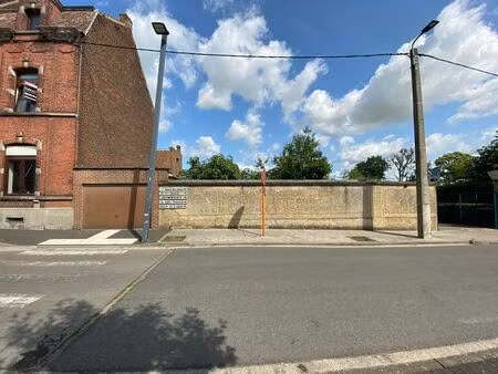 terrain à bâtir + maison dans le centre de soignies