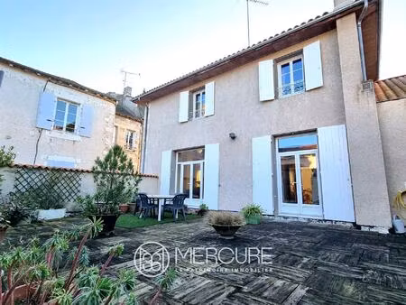 maison de ville  local commercial et terrasse