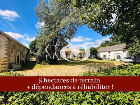 maison de plain pied 4 chambres sur un parc d'environ 5 hect