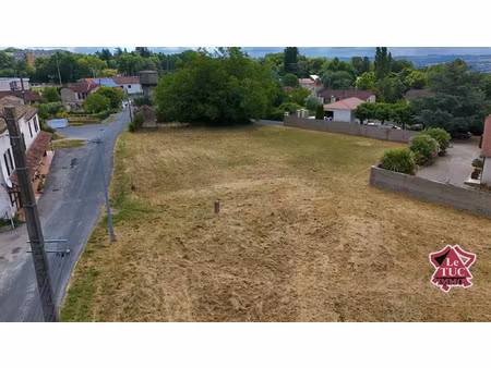 ensemble de 3 terrains constructibles.