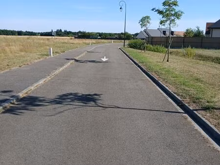15 mn evreux  terrains à bâtir viabilisés dans bourg avec commerces et écoles