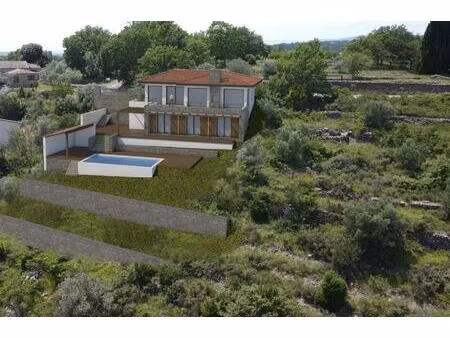 terrain à bâtir de 3560 m2 viabilisé avec permis de construire pour une villa avec...
