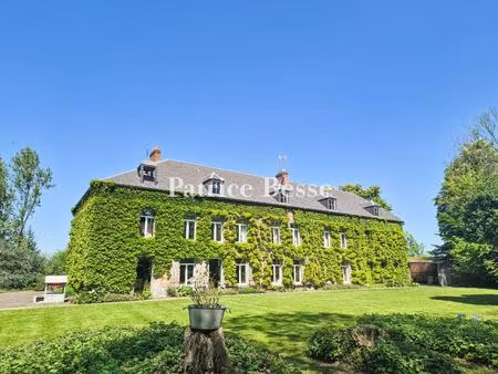à 100 km de lille  dans le parc naturel régional de l'avesnois  une gentilhommière et son.