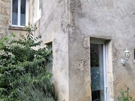 maison de ville avec jardin  beaucoup de potentiel