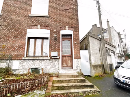 maison semi-individuelle avec garage à conforter