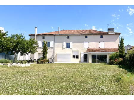 ensemble immobilier : maison + 3 appartements sur une parcel