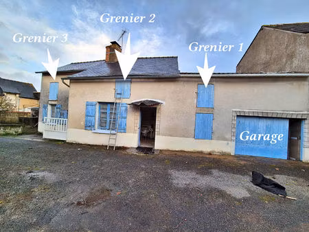 maison entièrement à rénover avec garage  petit jardin