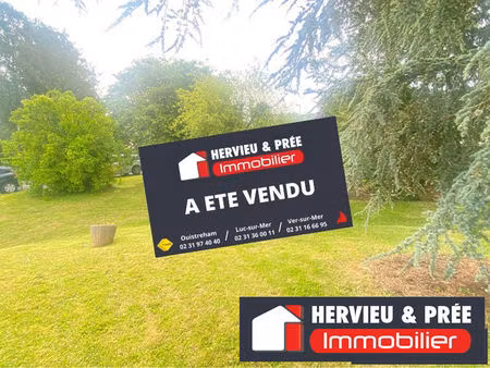terrain constructible à mouen - 870 m² - proche de caen