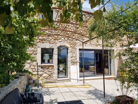 maison avec jardinet et terrasses avec vue panoramique